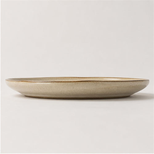 Grande assiette plate irrégulière 26,5 cm — Yunhuang, vue de profil